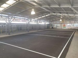 Handhall courts and a volleyball court at Swansea Public school.