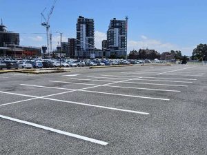 Limemarking and concrete wheelstops installed at honeysuckle carpark Newcastle.