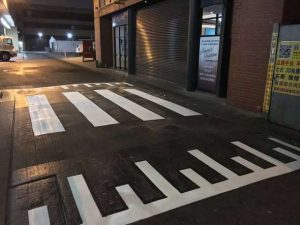 Some of the finishing line marking touches at Auburn central shopping centre.