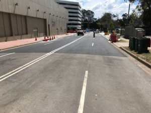 Road markings, crossings and bus zone at Parramatta Stadium.